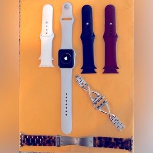 Apple Watch Series 3 with extra bands.